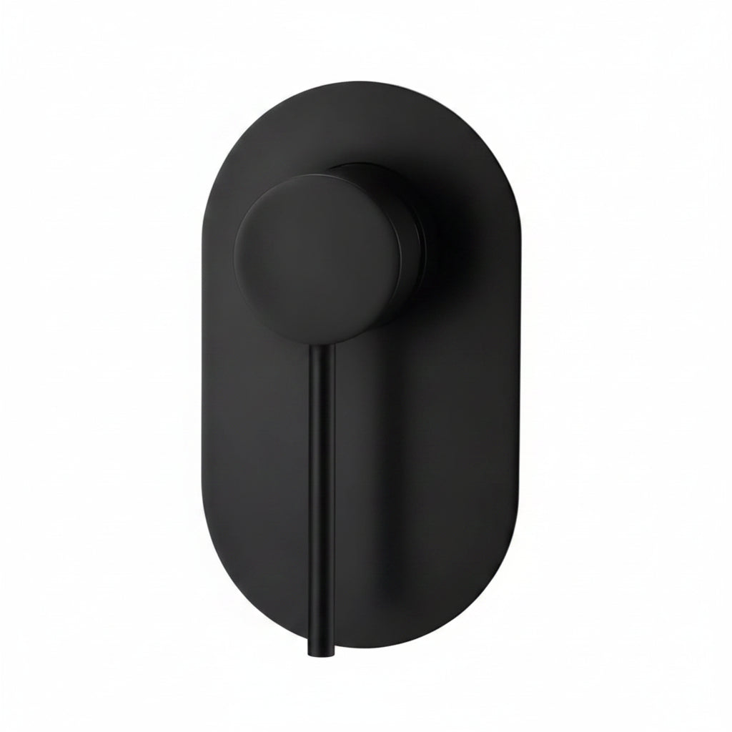 Matte black wall mixer tap with minimalist round plate in a luxury modern bathroom with warm natural lighting