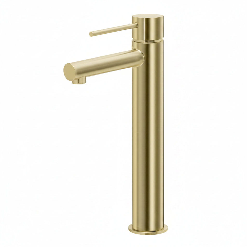 Elegant brushed gold basin mixer installed on a minimalist stone vanity with soft natural shadows and warm decor
